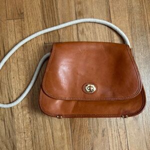 LL Bean leather purse with rope handle and turn lock